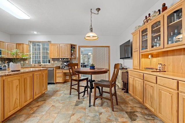 815 E Shelter Ln, Deer Park, WA 99006 - kitchen featuring dishwasher, backsplash, light stone finish floors, and glass insert cabinets