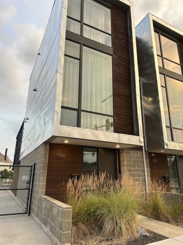 view of building exterior featuring fence
