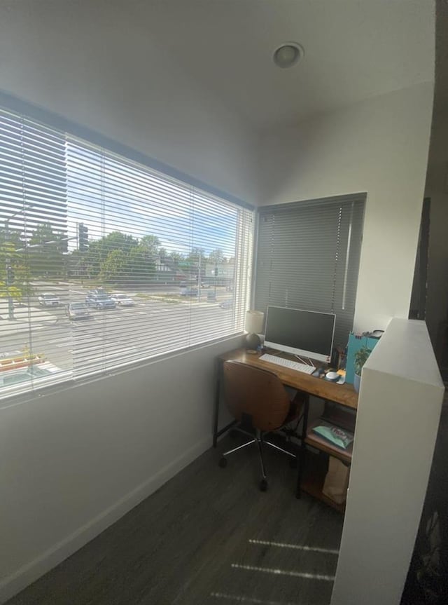 office featuring baseboards and wood finished floors