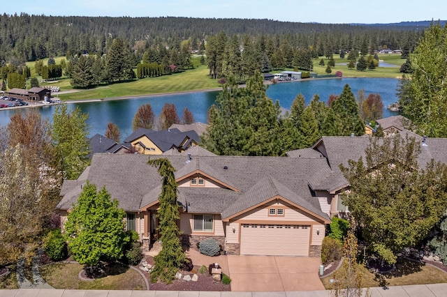 813 E Wandermere Estates Ln, Spokane, WA 99208 - view of subject property featuring a nearby body of water and a forest