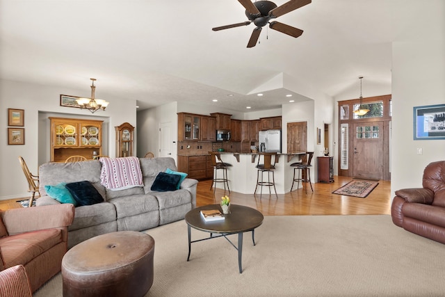 813 E Wandermere Estates Ln, Spokane, WA 99208 - living room featuring light wood-style flooring, a chandelier, recessed lighting, ceiling fan, and high vaulted ceiling