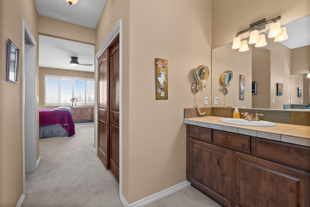 813 E Wandermere Estates Ln, Spokane, WA 99208 - bathroom with vanity, ensuite bath, and ceiling fan