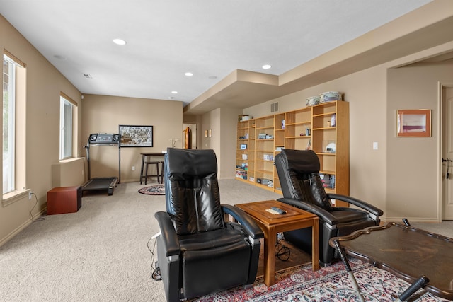 sitting room featuring carpet flooring, recessed lighting, and baseboards