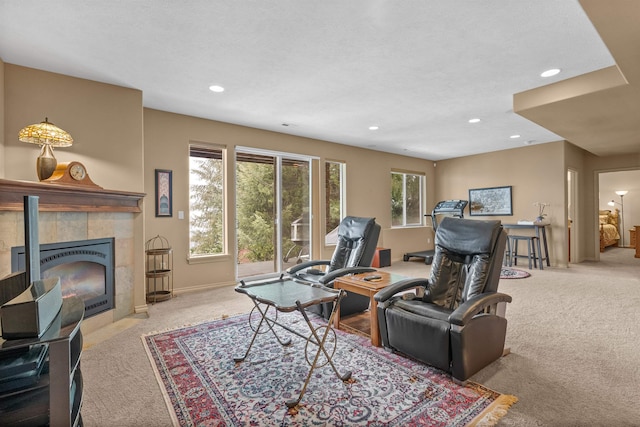 813 E Wandermere Estates Ln, Spokane, WA 99208 - carpeted living room with a tiled fireplace and recessed lighting