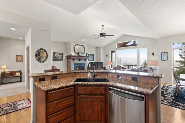 813 E Wandermere Estates Ln, Spokane, WA 99208 - kitchen with dishwasher, open floor plan, ceiling fan, lofted ceiling, and light wood-style floors