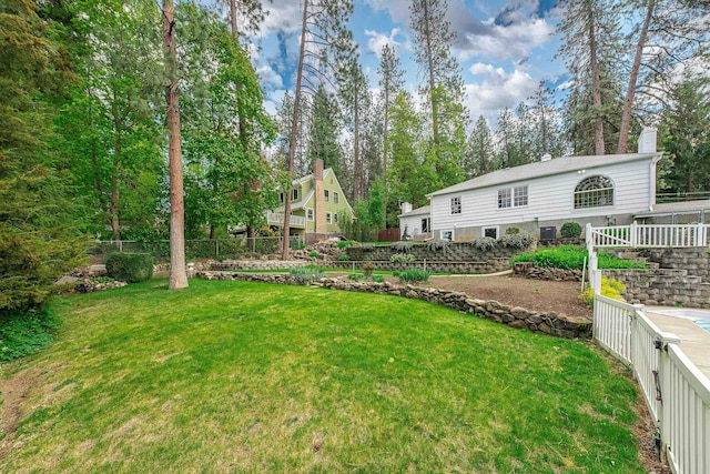view of yard with fence
