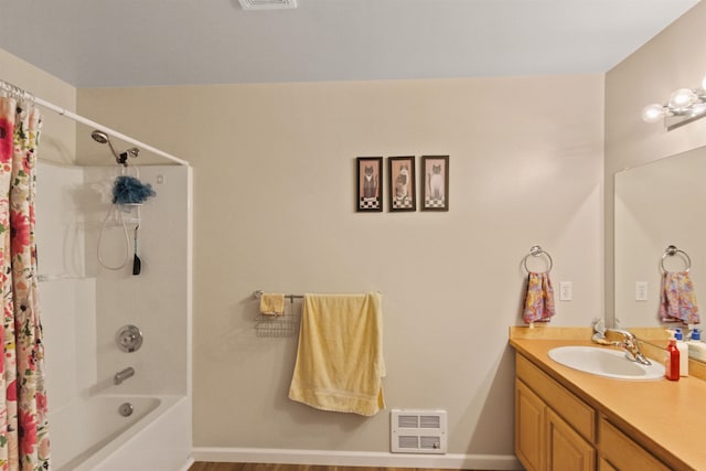 full bath with visible vents, shower / tub combo, and vanity