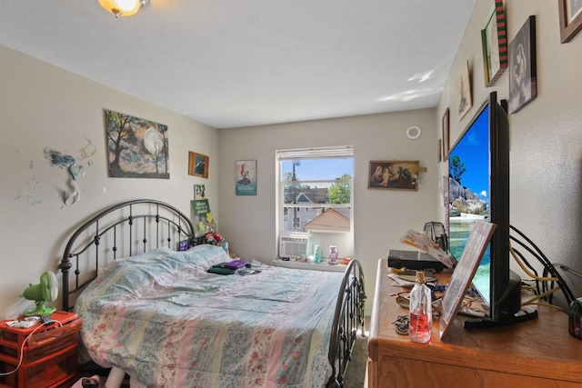 bedroom with cooling unit