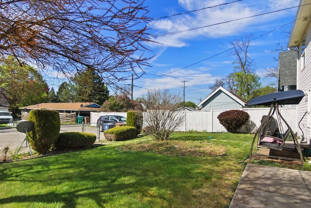 view of yard with fence