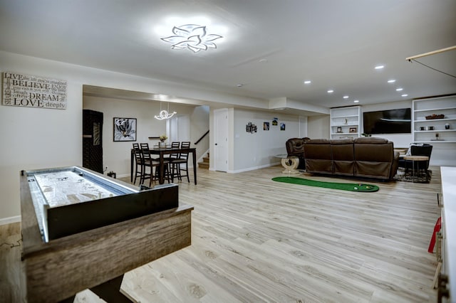 rec room featuring baseboards, recessed lighting, and wood finished floors