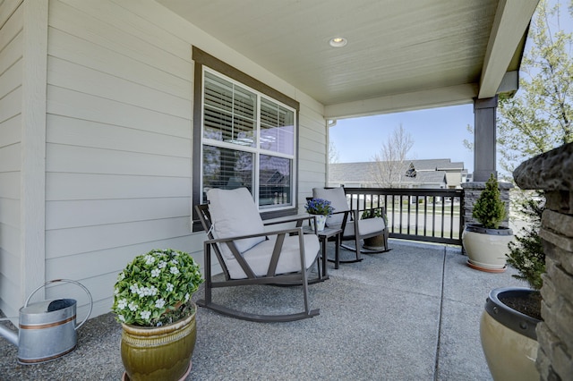 balcony featuring a porch