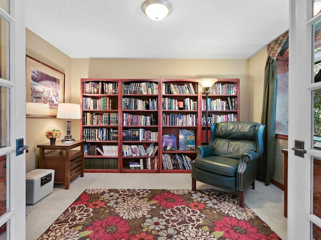 living area with carpet floors