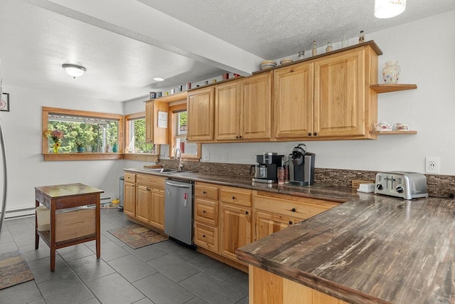 kitchen featuring dark countertops, open shelves, a sink, dishwasher, and a textured ceiling