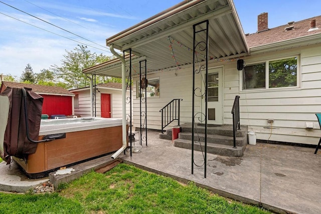 exterior space featuring a hot tub