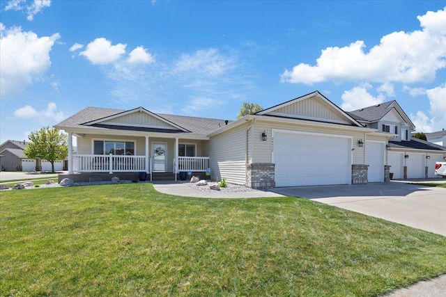 view of front facade featuring a garage, a front lawn, board and batten siding, concrete driveway, and a porch