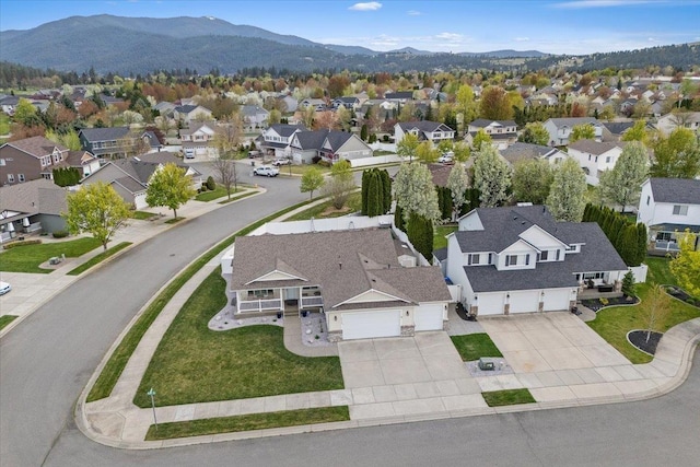 aerial view with a mountain view and a residential view