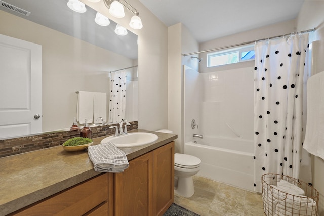 bathroom featuring vanity, toilet, shower / bathtub combination with curtain, decorative backsplash, and visible vents