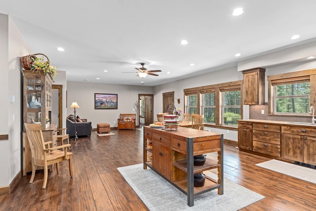 5034 Bittrich Antler Rd, Deer Park, WA 99006 - kitchen featuring brown cabinets, recessed lighting, a ceiling fan, and dark wood-style floors