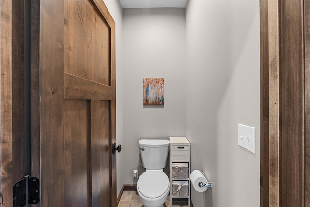 5034 Bittrich Antler Rd, Deer Park, WA 99006 - bathroom with baseboards, tile patterned floors, and toilet