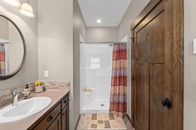 5034 Bittrich Antler Rd, Deer Park, WA 99006 - full bath featuring vanity, stone finish floor, and a shower with curtain