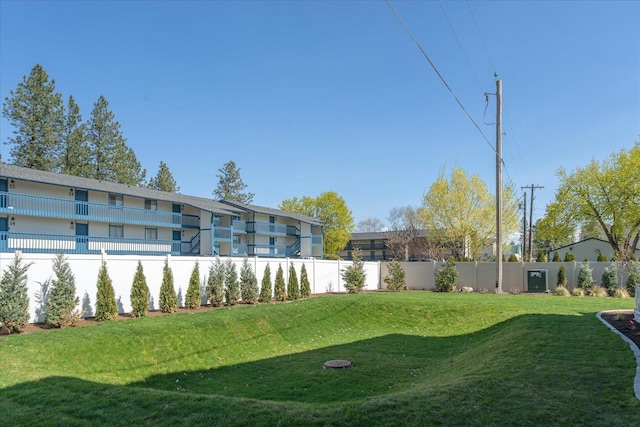 view of yard with fence