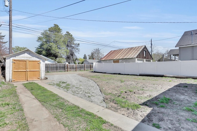 3903 E Hartson Ave, Spokane, WA 99202 - fenced backyard featuring a storage unit