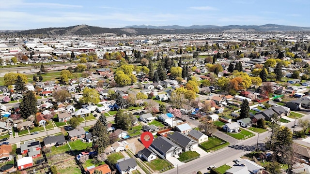 3903 E Hartson Ave, Spokane, WA 99202 - aerial overview of property's location featuring a mountainous background and nearby suburban area