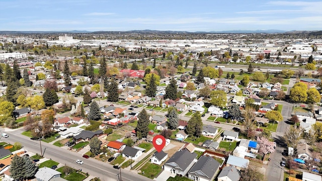 3903 E Hartson Ave, Spokane, WA 99202 - aerial overview of property's location with nearby suburban area and mountains
