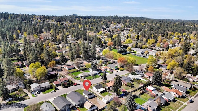 3903 E Hartson Ave, Spokane, WA 99202 - aerial view of property's location featuring a heavily wooded area and nearby suburban area