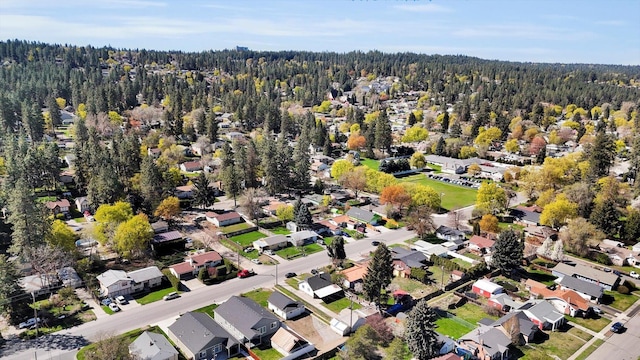 3903 E Hartson Ave, Spokane, WA 99202 - aerial view of property and surrounding area featuring a forest and nearby suburban area