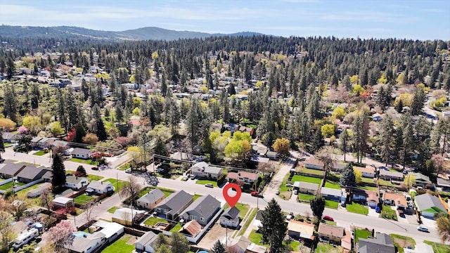 3903 E Hartson Ave, Spokane, WA 99202 - aerial view of property's location with mountains and nearby suburban area