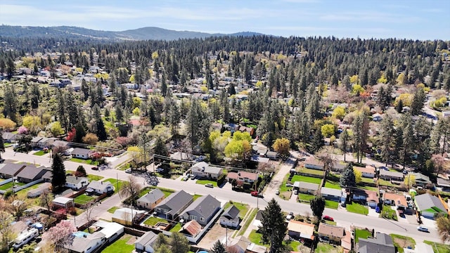 3903 E Hartson Ave, Spokane, WA 99202 - aerial view of property and surrounding area featuring a mountainous background and nearby suburban area