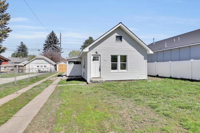 3903 E Hartson Ave, Spokane, WA 99202 - view of front of house with driveway, an outbuilding, and entry steps