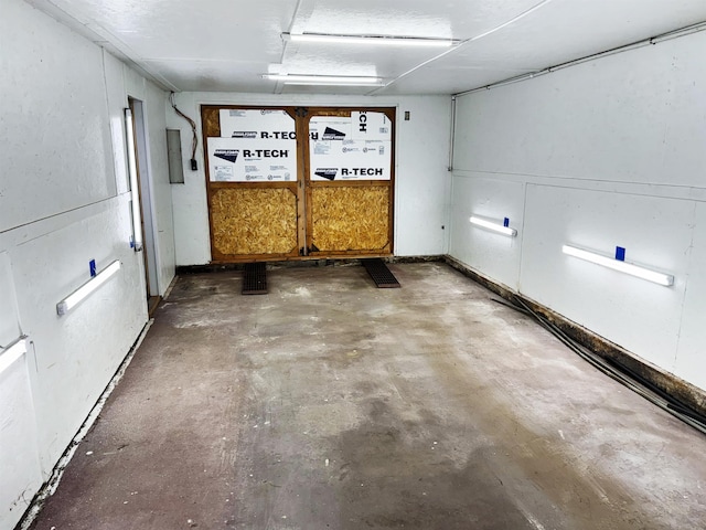 interior space featuring unfinished concrete floors