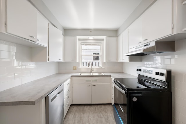kitchen with white cabinets, a sink, dishwasher, range with electric cooktop, and under cabinet range hood