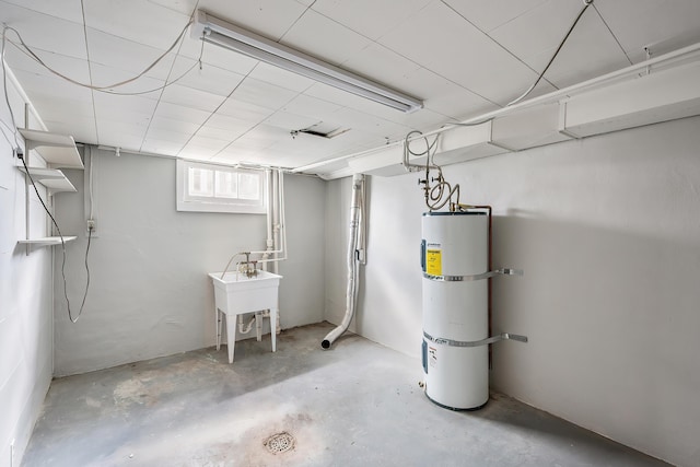 below grade area featuring water heater