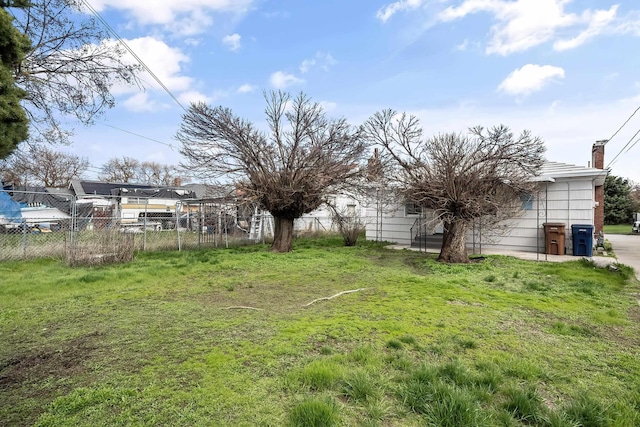 view of yard with fence