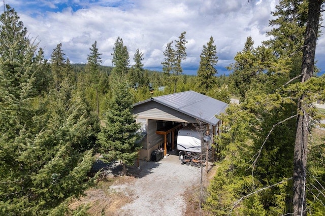 362 Panorama Dr, Newport, WA 99156 - exterior space featuring a view of trees, a carport, and driveway
