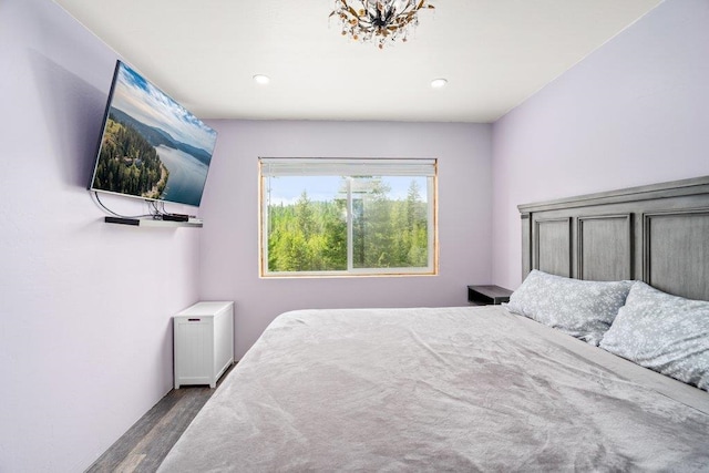 362 Panorama Dr, Newport, WA 99156 - bedroom featuring recessed lighting, an inviting chandelier, and wood finished floors