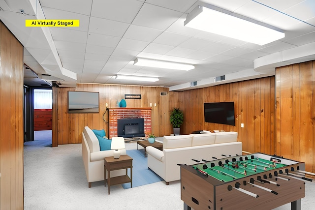 rec room featuring visible vents and wood walls