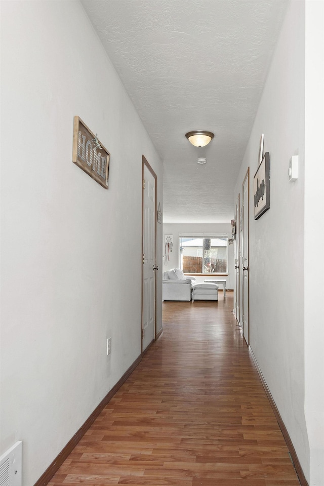 3713 S Harrison St, Spokane, WA 99224 - hallway featuring baseboards and wood finished floors