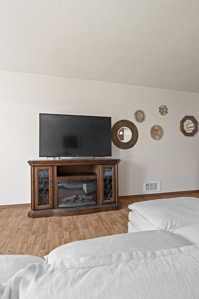 3713 S Harrison St, Spokane, WA 99224 - interior space with baseboards, wood finished floors, and visible vents