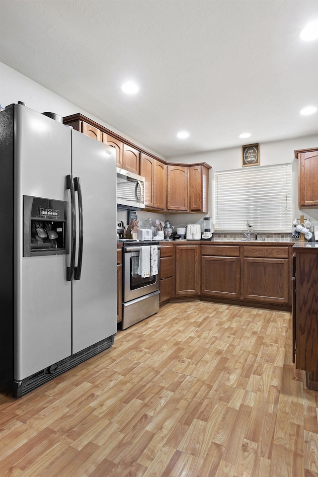 3713 S Harrison St, Spokane, WA 99224 - kitchen featuring light wood-style floors, recessed lighting, and stainless steel appliances