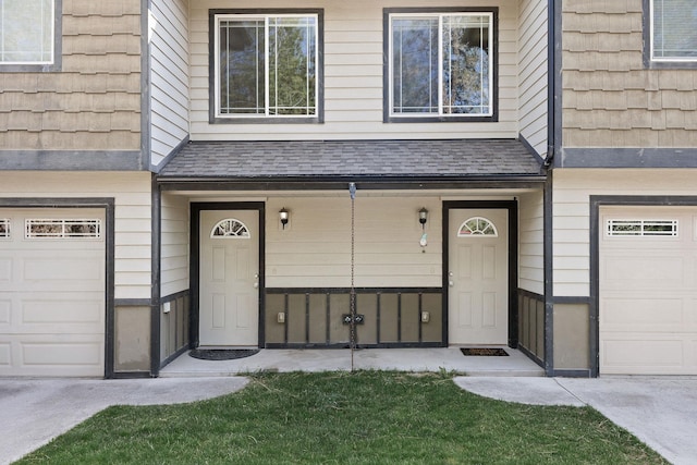 3713 S Harrison St, Spokane, WA 99224 - property entrance with a shingled roof, an attached garage, and concrete driveway