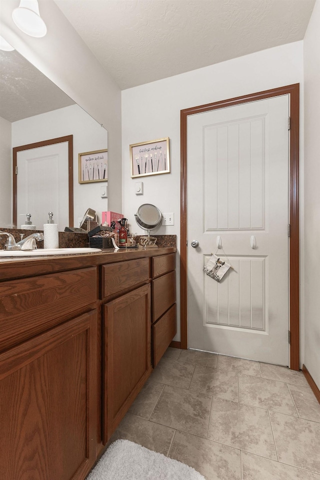 3713 S Harrison St, Spokane, WA 99224 - bathroom with vanity and baseboards
