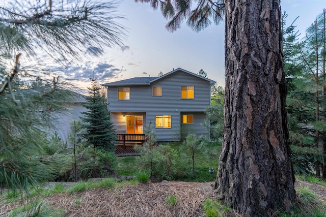 rear view of property with a deck