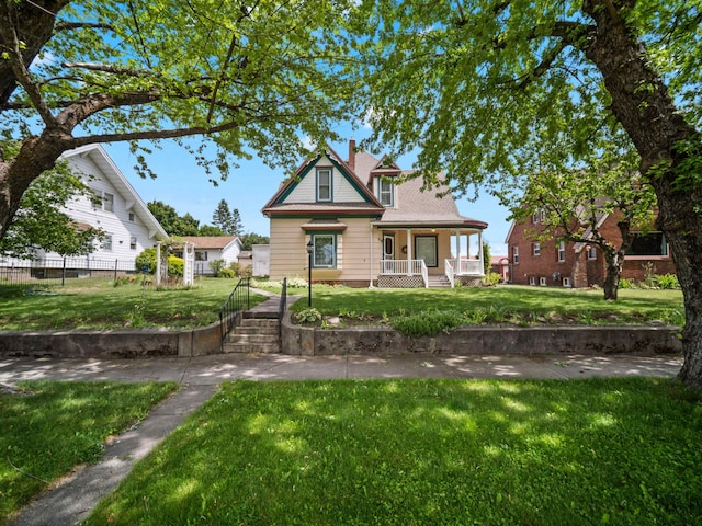 218 S Broadway St, Tekoa, WA 99033 - view of front facade with covered porch and a chimney