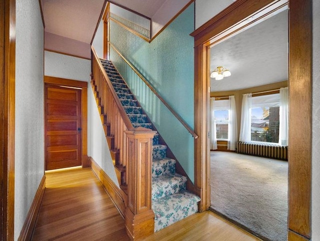 218 S Broadway St, Tekoa, WA 99033 - staircase featuring wood finished floors and baseboards