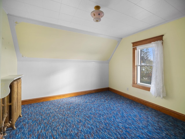 218 S Broadway St, Tekoa, WA 99033 - additional living space with carpet floors and lofted ceiling