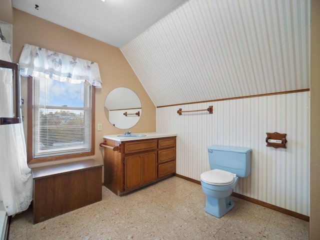 218 S Broadway St, Tekoa, WA 99033 - bathroom featuring vanity, lofted ceiling, and tile patterned floors